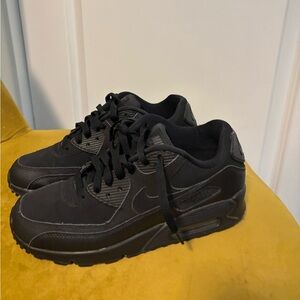 Woman’s Nike Air maxes Triple Black Sneakers